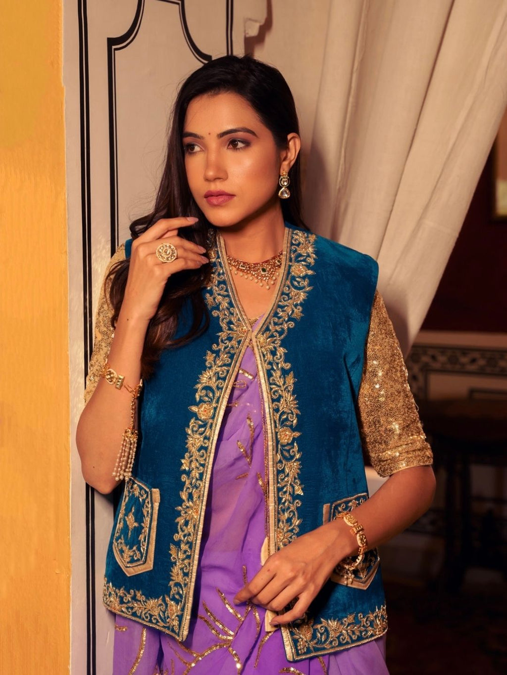 Teal Velvet Sleeveless Jacket With Gold Zari Embroidery