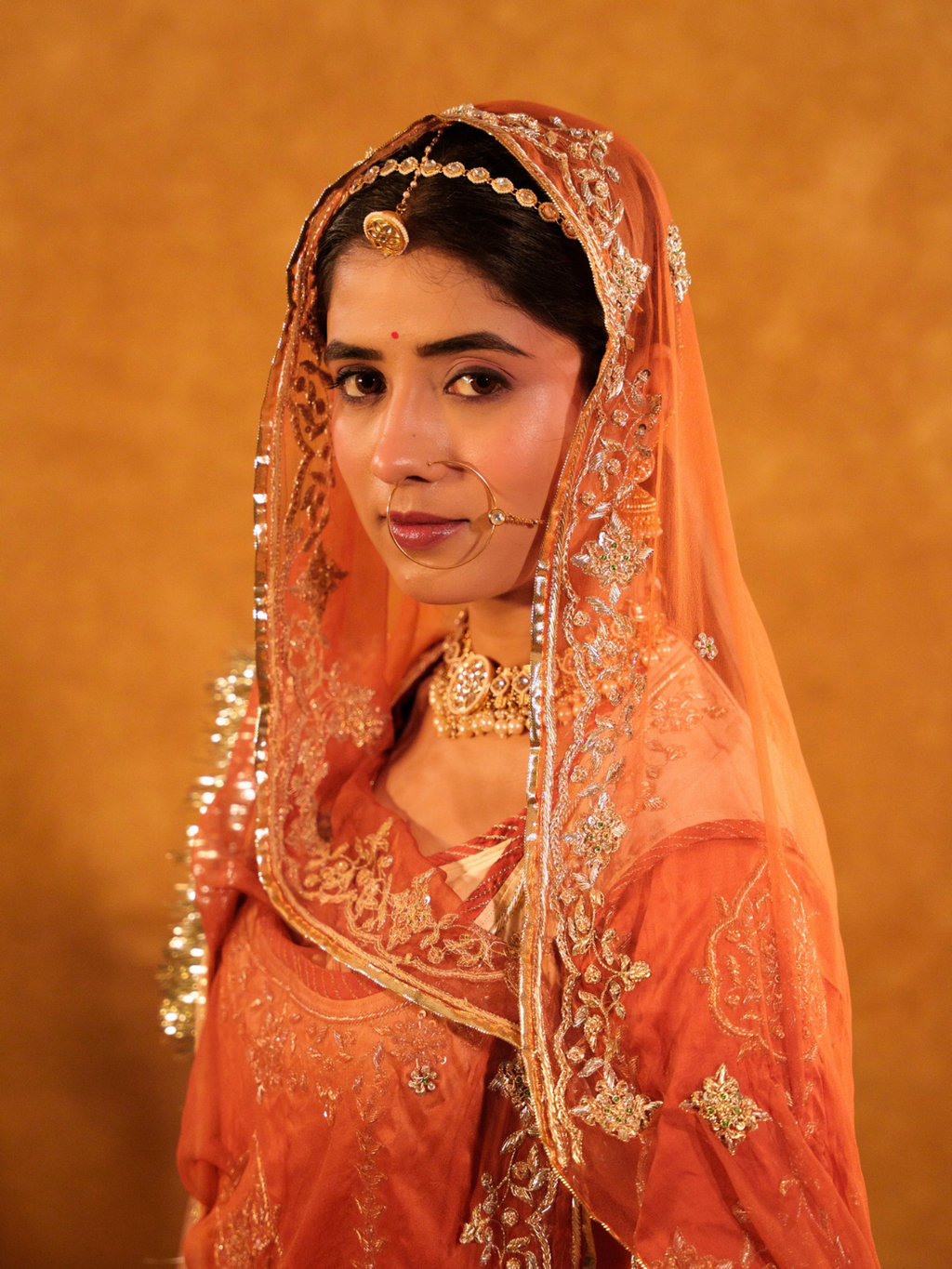 Peach Orange Satin Rajputi Poshak With Heavy Zardozi work